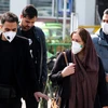 Người dân đeo khẩu trang phòng tránh dịch COVID-19 tại Tehran, Iran, ngày 22/2. (Ảnh: AFP/TTXVN)