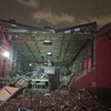 Bức tường của một nhà hàng Geist ở trung tâm thành phố Nashville bị sập đổ do lốc xoáy. (Ảnh: AP)