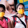 Người dân đeo khẩu trang để phòng tránh lây nhiễm COVID-19 tại Colombo, Sri Lanka, ngày 18/3/2020. (Ảnh: THX/TTXVN)