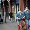 Người dân đeo khẩu trang phòng ngừa dịch COVID-19 tại New York, Mỹ ngày 3/4/2020. (Ảnh: THX/TTXVN)