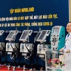 Tiến sỹ-bác sỹ Phan Văn Báu, Giám đốc Bệnh viện Nhân dân 115 chia sẻ về tầm quan trọng của các trang thiết bị y tế hiện đại trong công tác điều trị COVID-19. (Ảnh: CTV/Vietnam+)