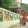 [Photo] Những con đường bích họa sống động và nên thơ ở Hoa Lư