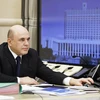 Thủ tướng Nga Mikhail Mishustin chủ trì cuộc họp trực tuyến với các thành viên Chính phủ tại Moskva, ngày 30/4/2020. (Ảnh: THX/TTXVN)