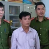 Đối tượng Dương Minh Hiến bị bắt giữ. (Ảnh: Võ Dung/TTXVN)