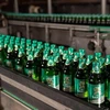 Dây chuyền sản xuất bia của Sabeco. (Ảnh: PV/Vietnam+)