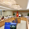 Bộ trưởng, Chủ nhiệm Văn phòng Chính phủ Mai Tiến Dũng chủ trì cuộc họp. (Ảnh: Dương Giang/TTXVN)