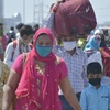 Dịch bệnh COVID-19 khiến hàng triệu lao động di cư tại Ấn Độ phải trở về quê hương. (Nguồn: Getty)