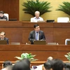 Bộ trưởng Bộ Kế hoạch và Đầu tư Nguyễn Chí Dũng phát biểu giải trình, làm rõ vấn đề đại biểu Quốc hội nêu. (Ảnh: Văn Điệp/TTXVN)