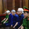 Các bị cáo tại phiên tòa ngày 13/7/2020. (Ảnh: Thành Chung/TTXVN)