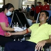 Người dân thành phố Lào Cai tham gia hiến máu tình nguyện tại Chương trình. (Ảnh: Quốc Khánh/TTXVN)