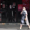 Người dân đeo khẩu trang phòng lây nhiễm COVID-19 tại Melbourne, Victoria, Australia, ngày 31/8/2020. (Ảnh: THX/TTXVN)
