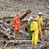 Lực lượng cứu hộ làm nhiệm vụ tại khu vực bị lở đất do ảnh hưởng của bão Haishen ở tỉnh Miyazaki, đảo Kyushu, Nhật Bản ngày 7/9/2020. (Ảnh: AFP/TTXVN)