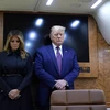 Tổng thống Mỹ Donald Trump cùng đệ nhất phu nhân Melania Trump mặc niệm các nạn nhân vụ khủng bố 11/9. (Nguồn: AP)