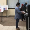 Cử tri bỏ phiếu sớm trong cuộc bầu cử Tổng thống Mỹ 2020 tại Arlington, bang Virginia, ngày 18/9/2020. (Ảnh: AFP/TTXVN)