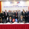 Lễ ký kết hoạt động của Hội đồng doanh nghiệp Việt Nam- châu Âu. (Ảnh: Trần Việt/TTXVN)