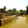 Cảnh ngập lụt do mưa lũ tại khu vực Al-Kadaro, phía Bắc thủ đô Khartoum, Sudan ngày 31/8/2020. (Ảnh: THX/TTXVN)