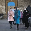 Người dân đeo khẩu trang phòng lây nhiễm COVID-19 tại Mashhad, Iran, ngày 29/10/2020. (Ảnh: THX/TTXVN)