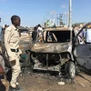 Hiện trường một vụ đánh bom tại thủ đô Mogadishu của Somalia. (Ảnh: Reuters/TTXVN)