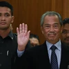 Thủ tướng Malaysia Muhyiddin Yassin (phải) tại một sự kiện ở Putrajaya ngày 9/3/2020. (Ảnh: AFP/ TTXVN)
