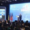 Phó Thủ tướng Thường trực Chính phủ Trương Hòa Bình phát biểu chào mừng. (Ảnh: Văn Điệp/TTXVN)