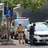 Cảnh sát giao thông Hà Nội ra quân xử lý xe ôtô dừng đỗ gây cản trở giao thông. (Nguồn: cand.com.vn)