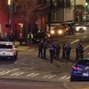 Cảnh sát Mỹ làm nhiệm vụ trên một đường phố ở Washington, DC. (Ảnh: AP/TTXVN)