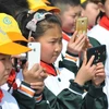 Học sinh Trung Quốc sẽ bị cấm mang điện thoại di động vào lớp. (Nguồn: China Daily)