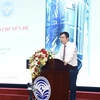 Ông Nguyễn Thanh Lâm, Cục trưởng Cục Báo chí trình bày báo cáo chuyên đề về việc thực hiện quy hoạch báo chí, kinh tế báo chí. (Ảnh: Minh Quyết/TTXVN)