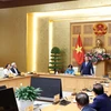 Thủ tướng Nguyễn Xuân Phúc gặp mặt các đại biểu, nhà hảo tâm đồng hành cùng Quỹ học bổng Vừ A Dính. (Ảnh: Thống Nhất/TTXVN)