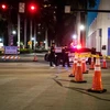 Cảnh sát phong tỏa một tuyến phố để phòng dịch COVID-19 tại Miami Beach, Mỹ, ngày 17/3/2021. (Ảnh: AFP/TTXVN)