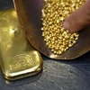Vàng được bày bán tại một tiệm kim hoàn ở Meyrin, gần Geneva, Thụy Sĩ. (Ảnh: AFP/TTXVN)