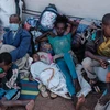 Trong ảnh: Người dân Ethiopia sơ tán từ vùng chiến sự Tigray tới lánh nạn tại một trại tị nạn ở bang Gedaref, Sudan, ngày 6/12/2020. (Ảnh: AFP/TXTVN)