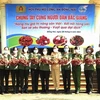 Hội phụ nữ Công an tỉnh Đồng Nai hỗ trợ tiêu thụ hơn 2,5 tấn vải thiều Bắc Giang. (Ảnh: TTXVN phát)