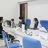 Cán bộ Trung tâm Phục vụ hành chính công tỉnh Quảng Ninh tiếp nhận hồ sơ thủ tục hành chính của công dân. (Nguồn: moc.gov.vn)