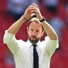 Huấn luyện viên Gareth Southgate vui mừng sau khi các học trò giành chiến thắng trong trận đấu với Croatia trên sân vận động Wembley ở London, Anh, ngày 13/6/2021. (Ảnh: AFP/TTXVN)