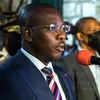 Thủ tướng lâm thời Haiti Claude Joseph trong cuộc họp báo ở Port-au Prince ngày 11/7/2021. (Ảnh: AFP/TTXVN)