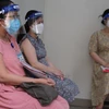 Các thai phụ đăng ký tiêm vaccine phòng COVID-19 tại Bệnh viện Hùng Vương Thành phố Hồ Chí Minh ngày 12/8. (Ảnh: TTXVN phát)