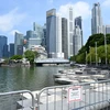 Singapore đóng cửa khu vực công cộng để phòng dịch COVID-19 tại Singapore, ngày 25/6/2021. (Ảnh: AFP/TTXVN)