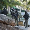 Cảnh sát Israel truy tìm các tù nhân Palestine vượt ngục tại Nau'ra, ngày 7/9/2021. (Ảnh: THX/TTXVN)