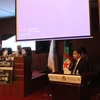 Tham tán Thương mại Hoàng Đức Nhuận phát biểu tại Hội thảo quốc tế với chủ đề "Kinh tế Algeria tầm nhìn 2030" diễn ra trong 2 ngày 25 và 26/9 tại tại tỉnh Skikda. (Ảnh: Tấn Đạt/TTXVN)