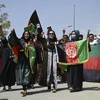 Người dân Afghanistan tuần hành phản đối Taliban nhân 102 năm Ngày Độc lập tại Kabul, ngày 19/8/2021. (Ảnh: AFP/TTXVN)