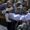 Đám tang một nạn nhân vụ đánh bom liều chết ở Thánh đường Hồi giáo thành phố Kandahar, Afghanistan, ngày 16/10/2021. (Ảnh: AFP/TTXVN)