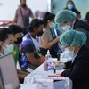 Tiêm vaccine ngừa COVID-19 tại Bangkok, Thái Lan, ngày 1/11/2021. (Ảnh: THX/TTXVN)