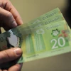 Đồng 20 đôla Canada. (Ảnh: AFP/TTXVN)
