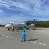 Chuyến bay chở vaccine hạ cánh an toàn xuống sân bay Côn Đảo. (Nguồn: cand.com.vn)