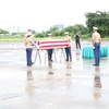 Cơ quan Việt Nam tìm kiếm người mất tích (VNOSMP) bàn giao một bộ hài cốt quân nhân Hoa Kỳ mất tích trong thời gian chiến tranh ở Việt Nam cho phía Hoa Kỳ. (Ảnh: TTXVN/phát)