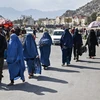 Phụ nữ trên đường phố tại Kabul, Afghanistan, ngày 29/10/2021. (Ảnh: AFP/TTXVN)