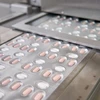 Thuốc Paxlovid điều trị COVID-19 của Pfizer được sản xuất tại Freiburg, Đức. (Ảnh: AFP/TTXVN)