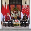 Thủ tướng Singapore Lý Hiển Long hội đàm với Tổng thống Indonesia Joko Widodo tại đảo Bintan của Indonesia ngày 25/1 năm 2022. (Nguồn: Reuters)