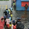 Mưa lớn do ảnh hưởng của bão Ana, gây ngập lụt tại nhiều khu vực ở Antananarivo, Madagascar, ngày 24/1/2022. (Ảnh: AFP/TTXVN)